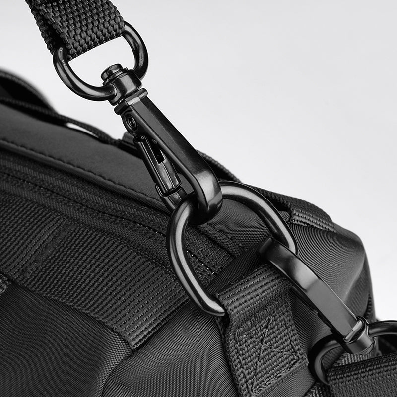 MarkRyden Global black crossbody bag strap hardware detail
