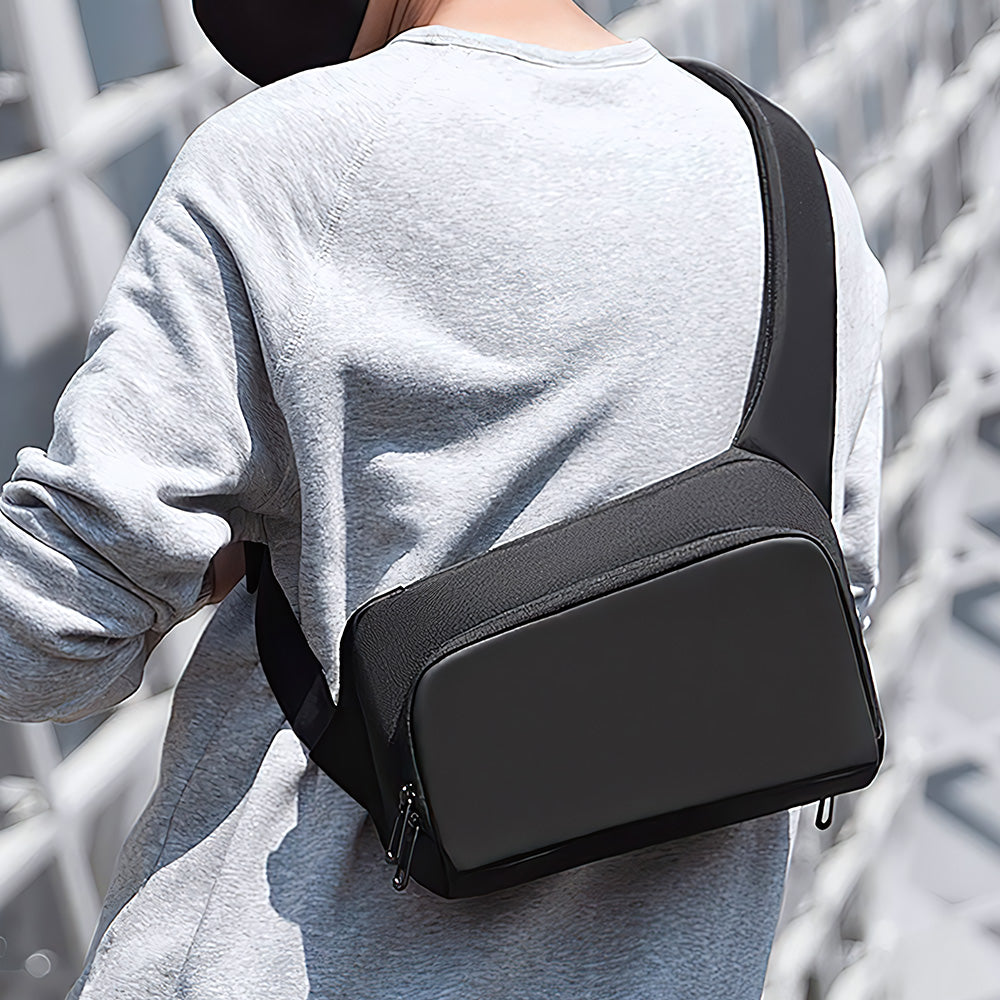 Breck Daily waterproof black crossbody bag on model - Mark Ryden Global