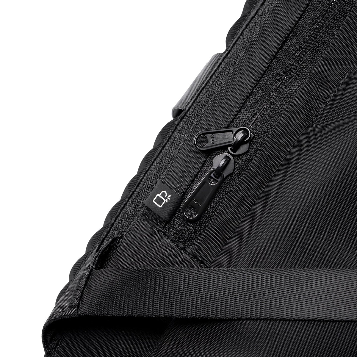Black Globalist 3-in-1 Tech Travel Backpack with anti-theft lock tag and dual zippers on durable fabric