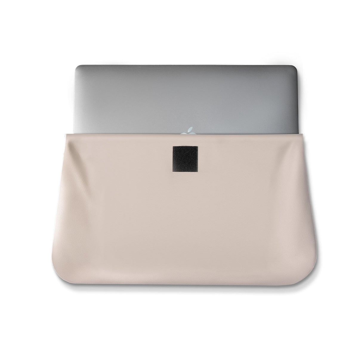 FortiCore rugged laptop briefcase in beige with silver laptop inside, black patch for secure closure, offering maximum protection and organization.
