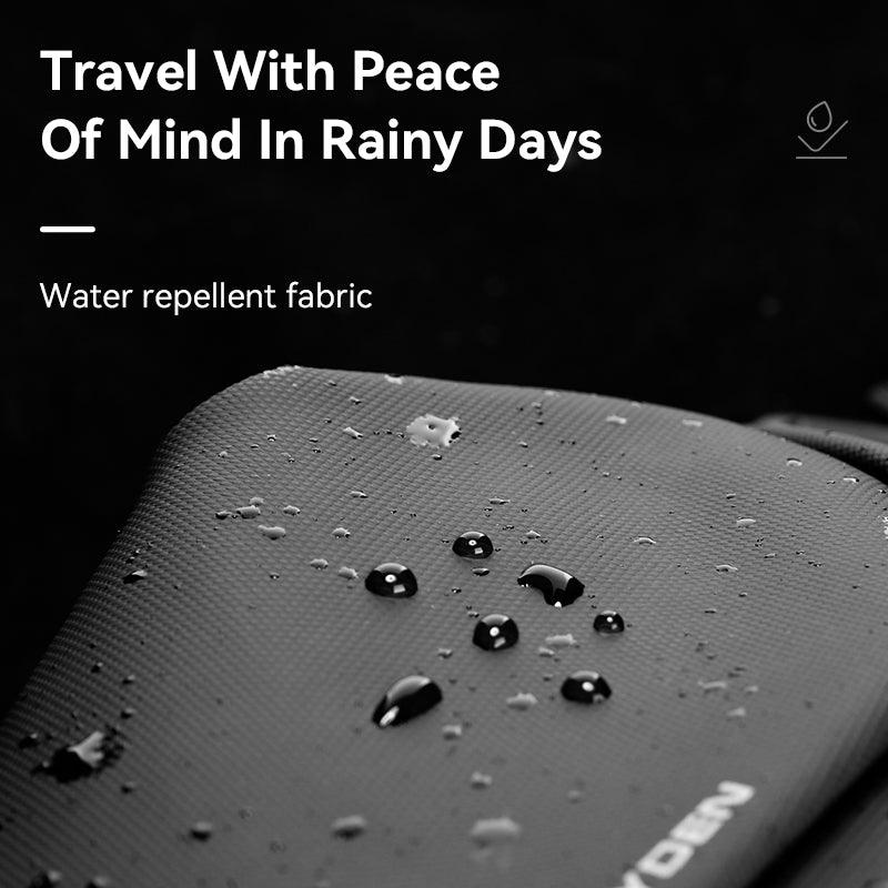 MarkRyden MetroFlex crossbody bag with water-resistant fabric showing rain protection