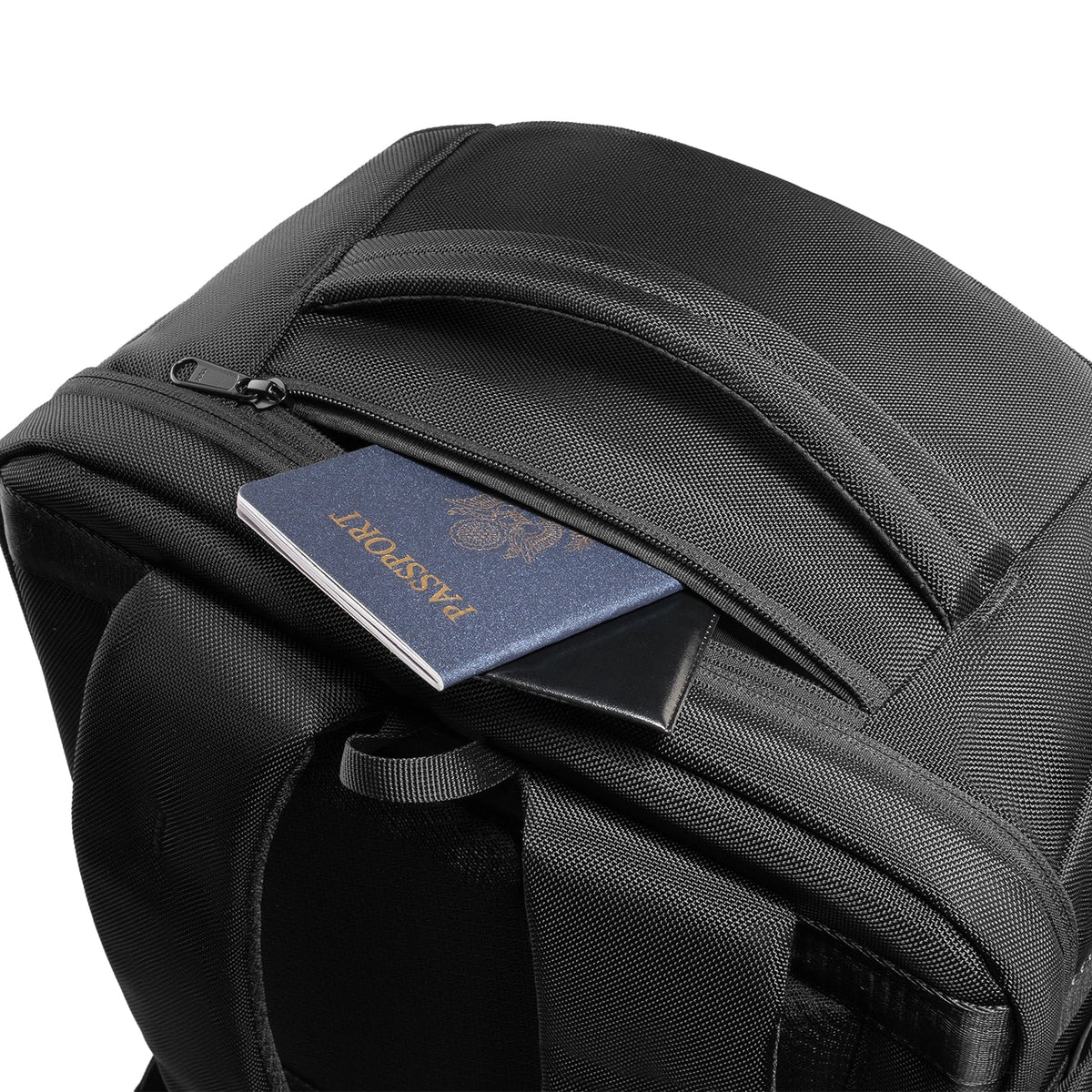 Mark Ryden Aegis Fortress backpack with blue passport in top pocket