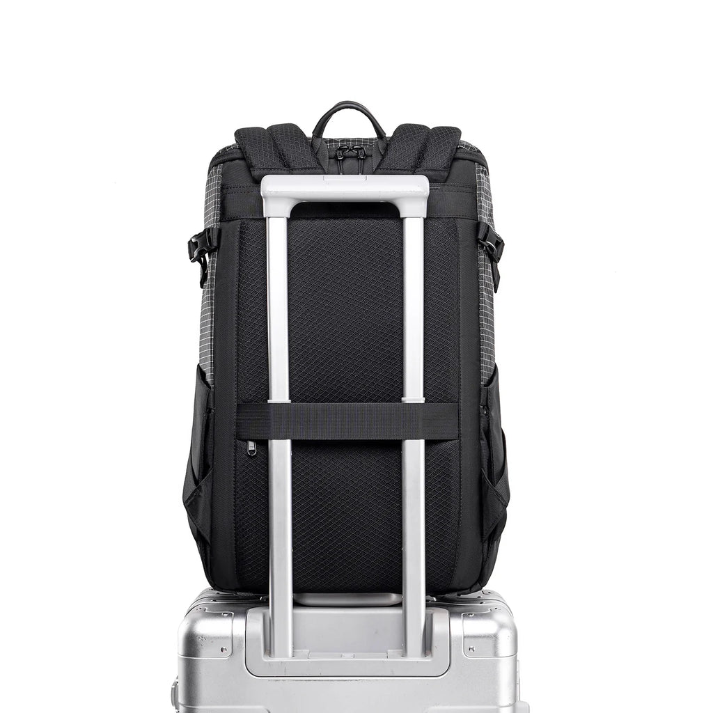 MARK RYDEN Global AeroPro 17.3" laptop backpack with telescopic handle on silver suitcase