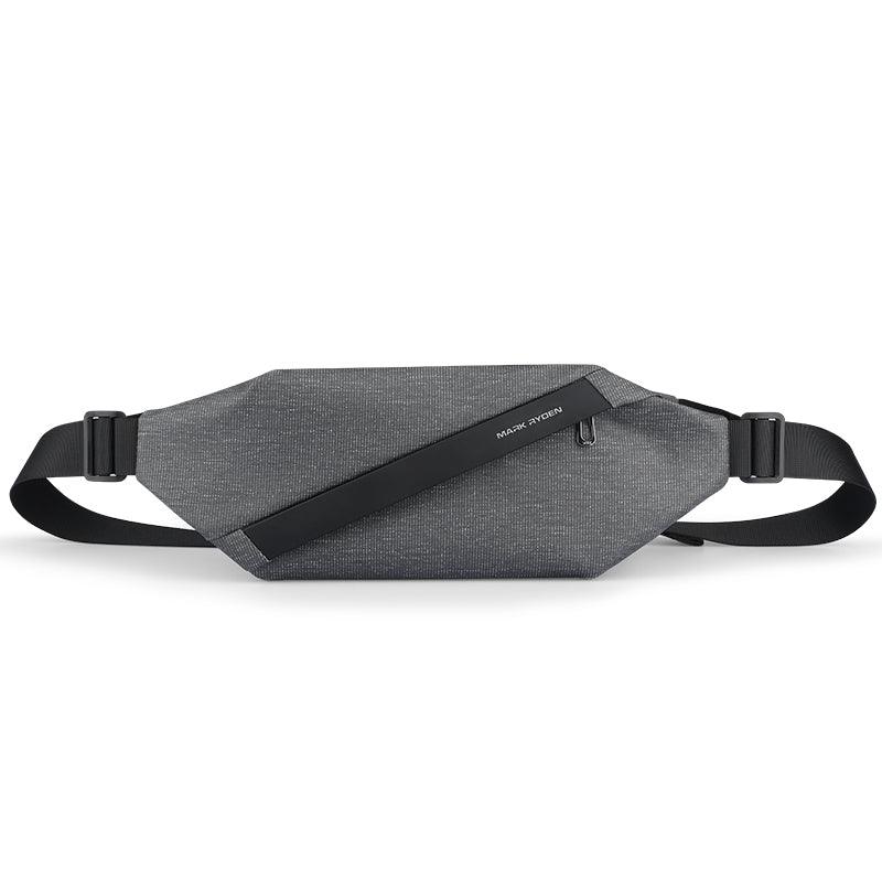 Gray textured UrbanStride Compact City Explorer’s Satchel Crossbody Bag with black adjustable straps and diagonal panel, Mark Ryden logo.